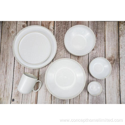 Reactive glazed stoneware dinner set in Creamy white